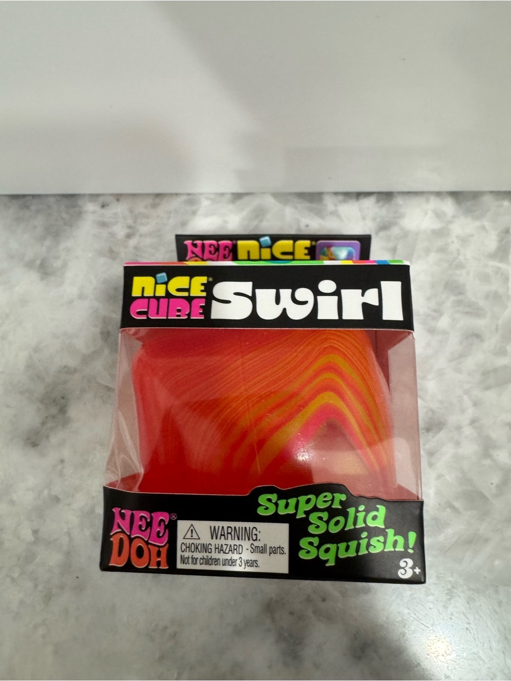 Nee Doh Nice Cube Swirl Super Solid Squish - Red & Orange Swirl Nee Doh